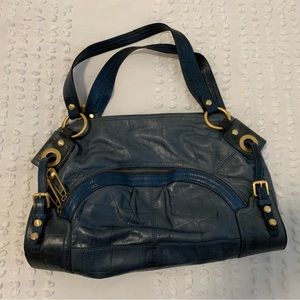 B. MAkowsky leather hand bag